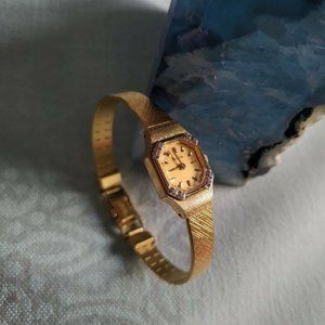 VINTAGE BULOVA WOMEN'S WATCH SWISS ETA 978.002 NEW BATTERY GOLD TONE T5 diamond?